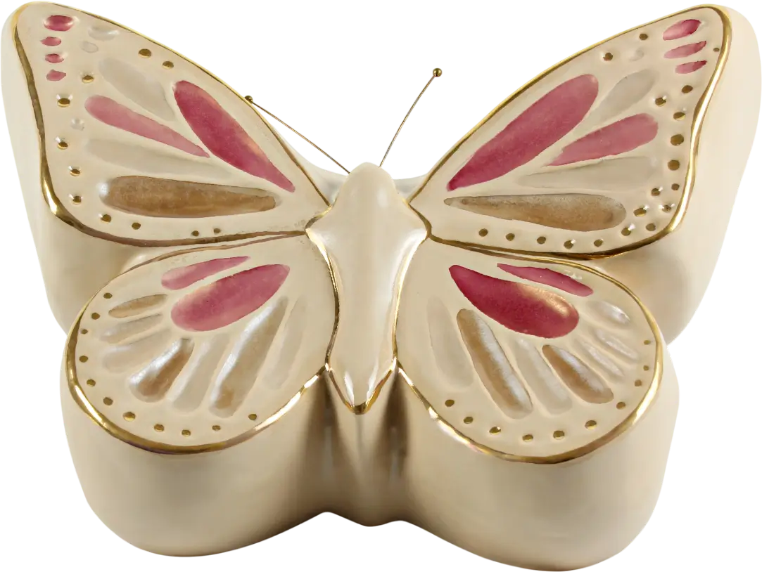 Mariposa decorativa de cerámica con detalles en tonos rosa y dorado, ideal para embellecer cualquier espacio.